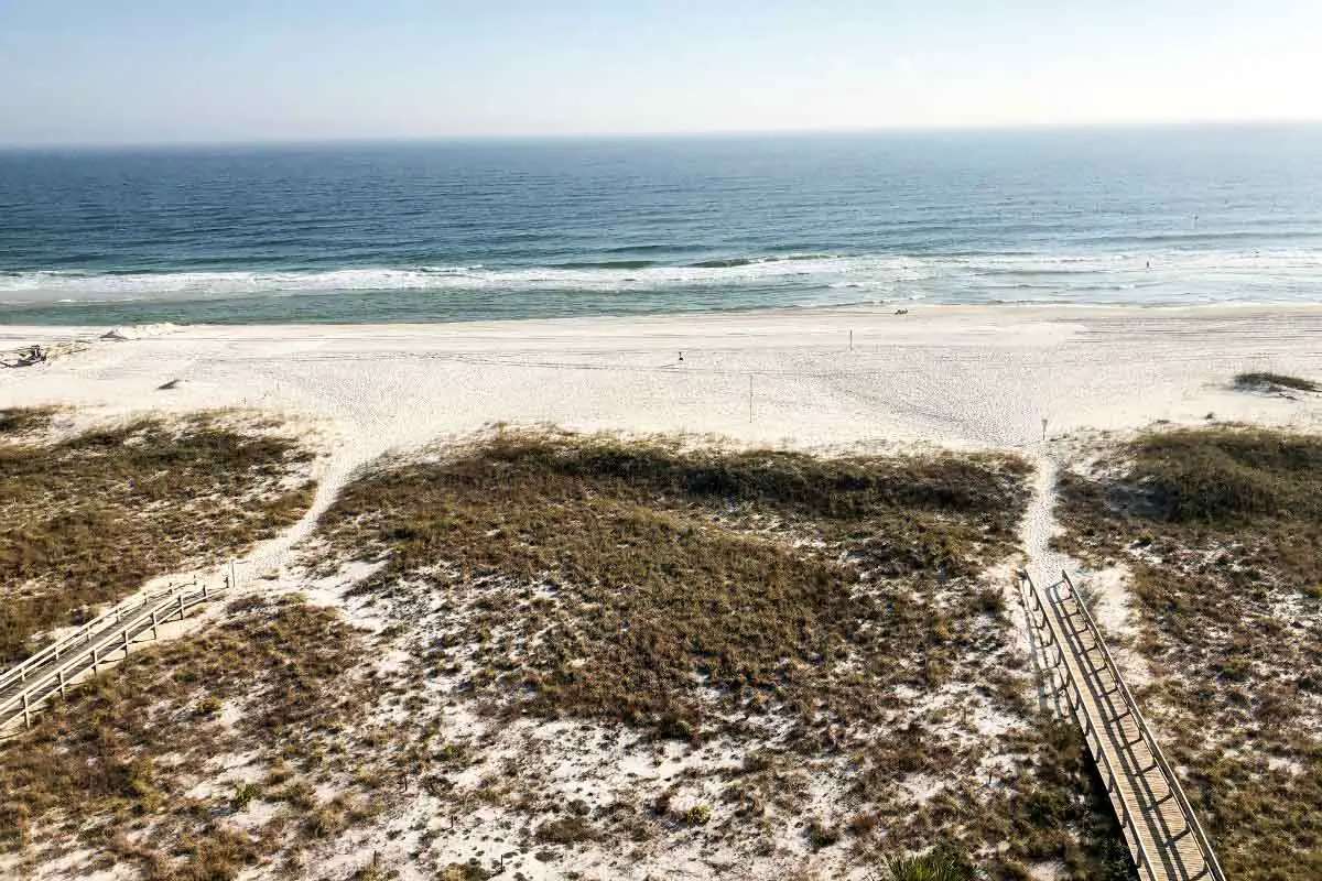 Island House Hotel view of white-sand beach along Gulf of Mexico in Orange Beach, Alabama, USA