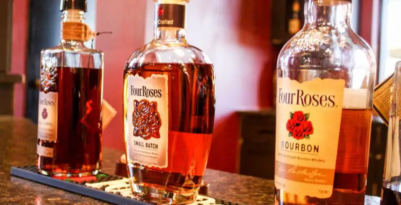 Three Four Roses bourbon bottles lined up for a bourbon tasting