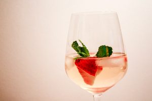 Strawberry Mint White Sangria in wine glass