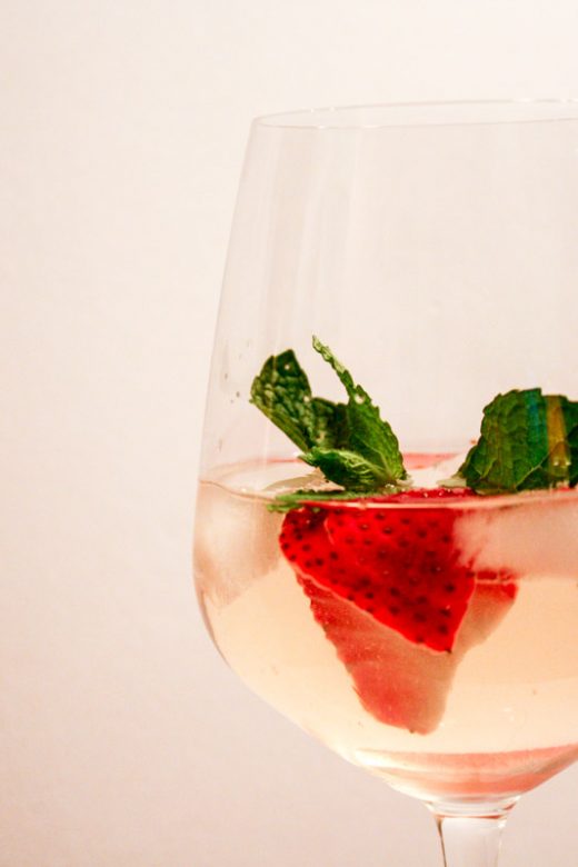 Strawberry Mint White Sangria in wine glass