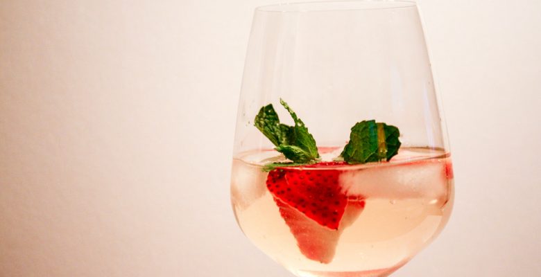 Strawberry Mint White Sangria in wine glass