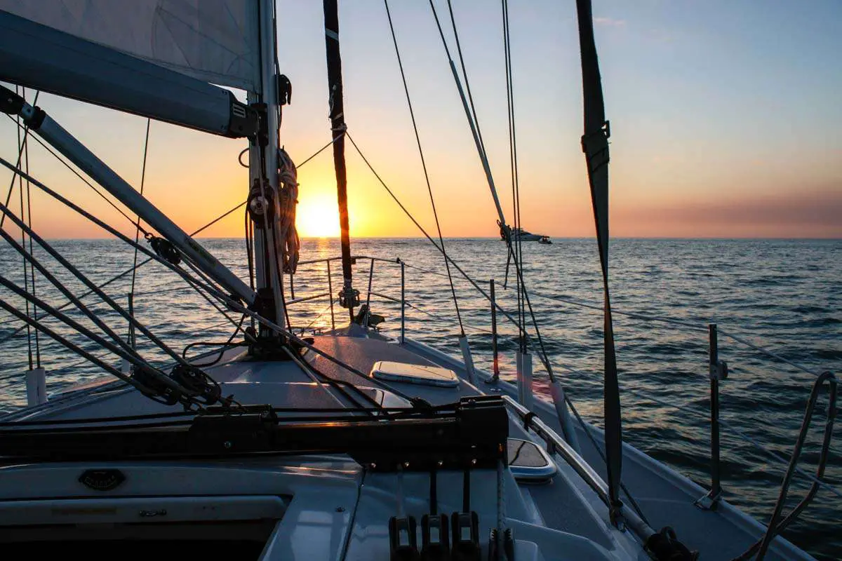 Sunset view over the Gulf of Mexico off the coast of Naples, Florida, USA, from a sail boat