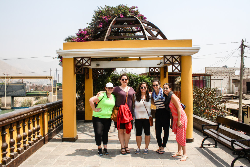 Five female travelers representing Unearth the World and Wanderful visit Chosica, Peru, after volunteering.