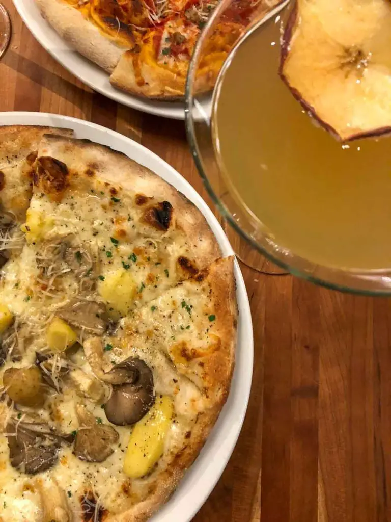 Seasonal pizzas and martinis during the fall season at Bistro Bella Vita, a romantic French and Italian restaurant with 20 signature martinis in downtown Grand Rapids, Michigan, USA