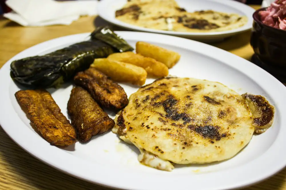 Tasty tamale, plantains, yuca frita, and pupusas at Pupuseria El Salvador | The Epicurean Traveler