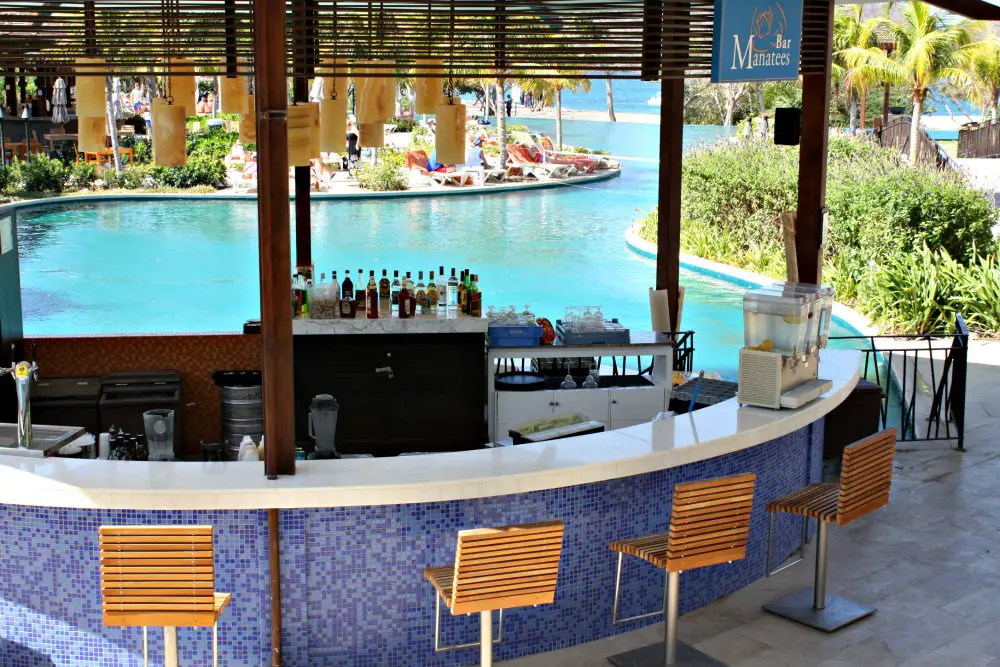 Dreams Las Mareas all-inclusive resort poolside swim-up bar