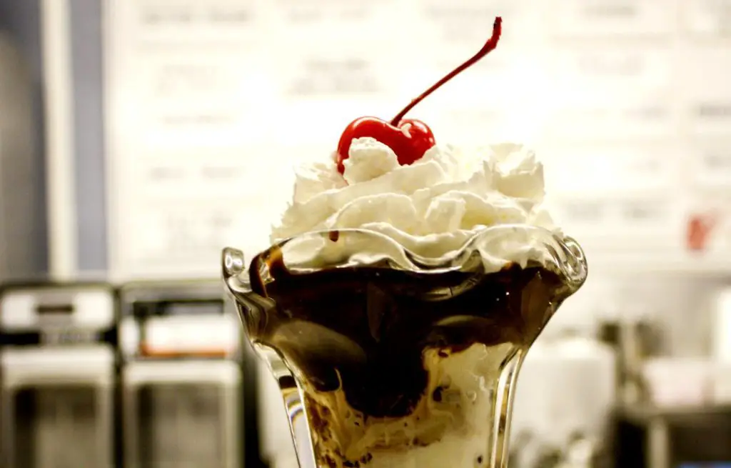 This chocolate-chip cookie dough ice cream sundae is topped with hot fudge, whipped cream, and a cherry at Door County Ice Cream Factory in Sister Bay, Wis. (Erin Klema/The Epicurean Traveler)