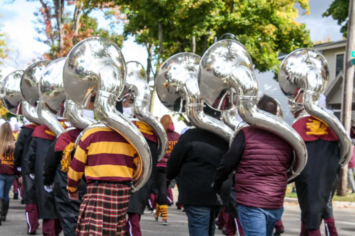 Central Michigan University Marching Chips walk in Homecoming parade