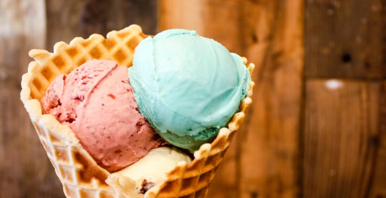 Waffle cone with three ice cream scoops