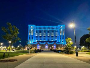 Michigan Central Station lit in Honolulu Blue light on a September 2024 evening