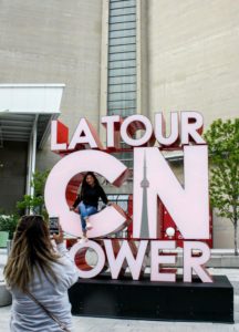 Taking touristy photos at the CN Tower is a must when visiting Toronto, Canada!