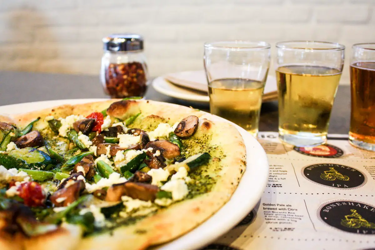 roasted veggie pizza with craft beer samples at Amsterdam BrewHouse in Toronto, Ontario, Canada