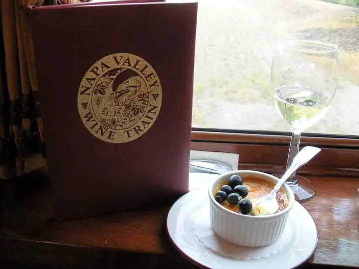 Creme brûlée dessert and moscato wine served on the Napa Valley Wine Train