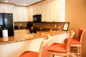 Looking into the full kitchen of the Bellasera Resort's two-bedroom suite in Naples, Florida