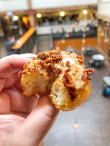 Maple bacon mini doughnut from Daily Dozen Doughnut Company at Pike Place Market in Seattle, Washington, USA