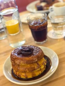 Big Pecan Praline Stack pancakes at Pancake Social, a breakfast restaurant at Ponce City Market in Atlanta, Georgia, USA