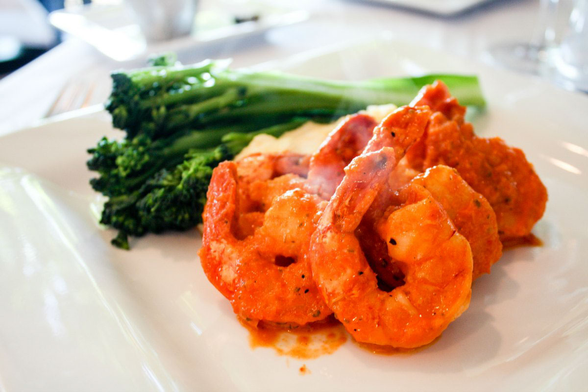 Shrimp, polenta, and broccolini at Twisted Olive, a coastal Mediterranean restaurant in Petoskey, Michigan