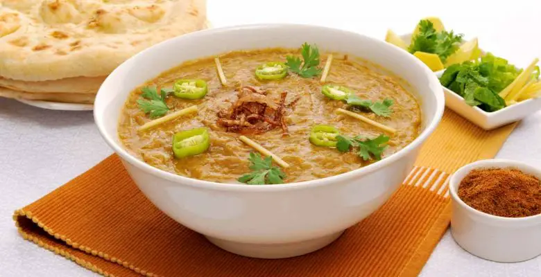 White bowl of haleem, a traditional Pakistani dish