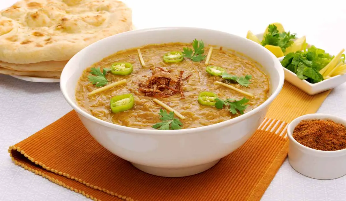 White bowl of haleem, a traditional Pakistani dish