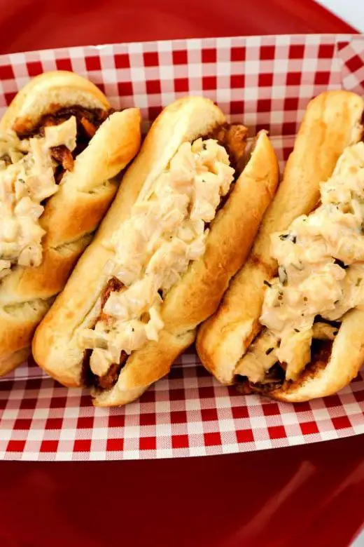 Easy Crock-Pot Recipe: Honey BBQ chicken sandwiches topped with Reser's Stadium Cole Slaw in brioche rolls