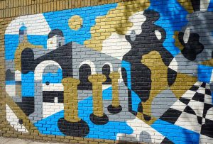 Street art mural by Greek street artist Cacao Rocks in Ann Arbor, Michigan, USA