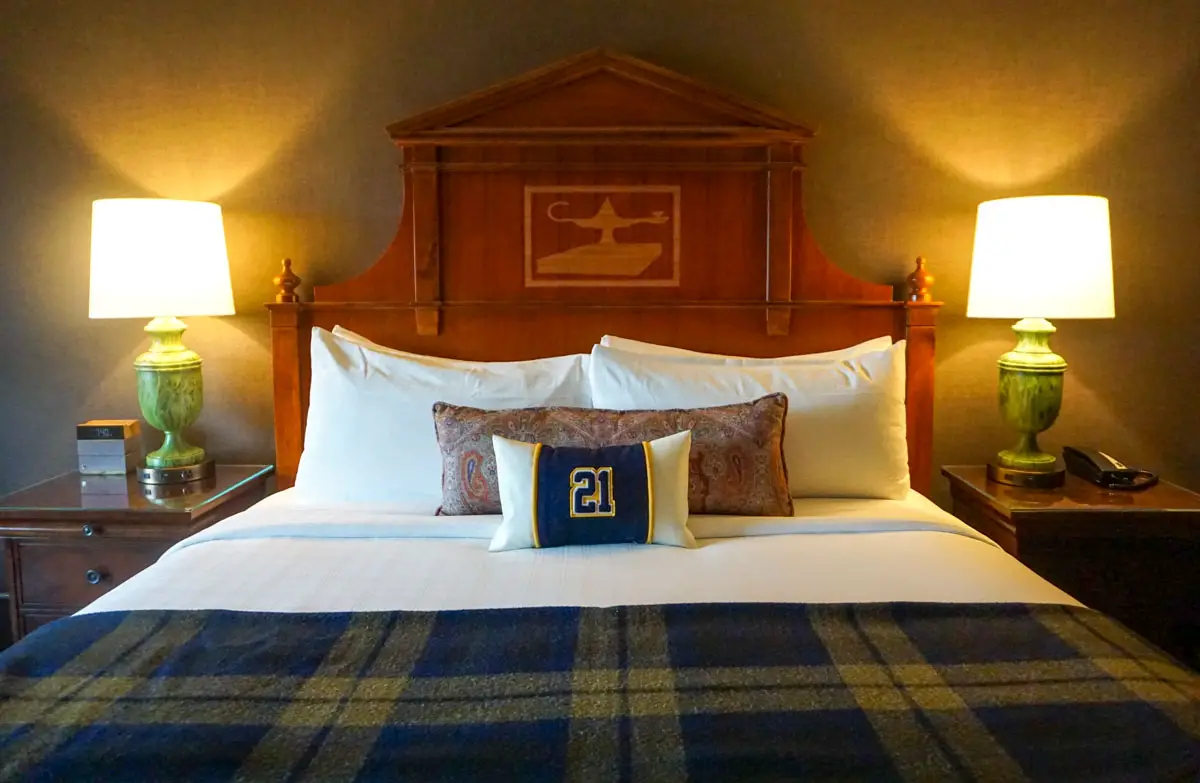 Guest room bed at Graduate Ann Arbor hotel in Ann Arbor, Michigan
