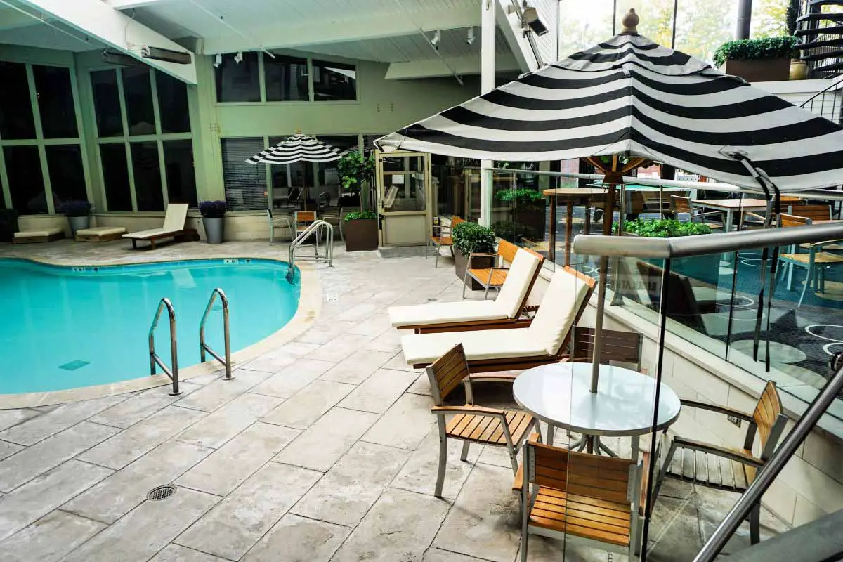 Weber's Boutique Hotel atrium with an indoor saltwater pool in Ann Arbor, Michigan, USA