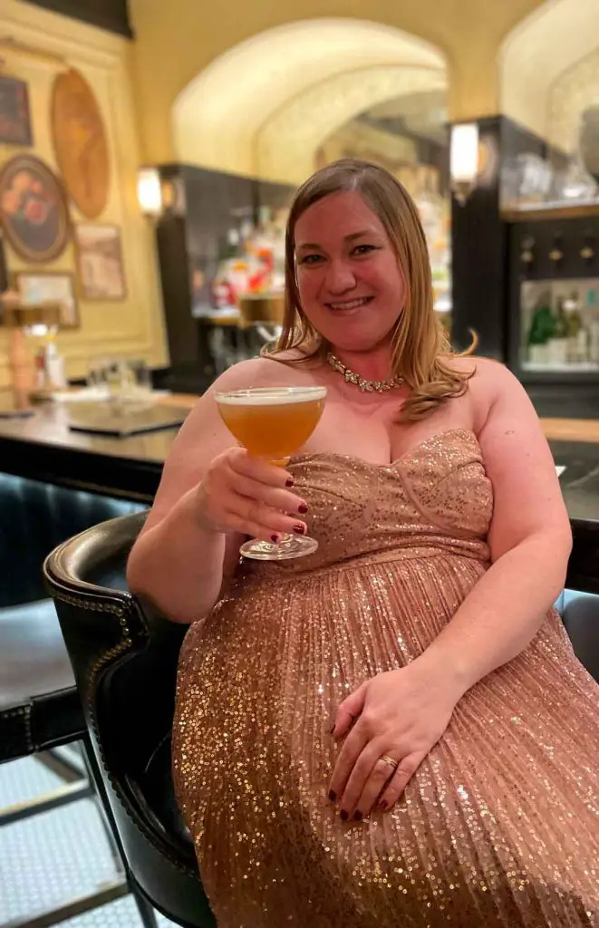 A diner of Weber's Restaurant sits at the bar with a French Martini