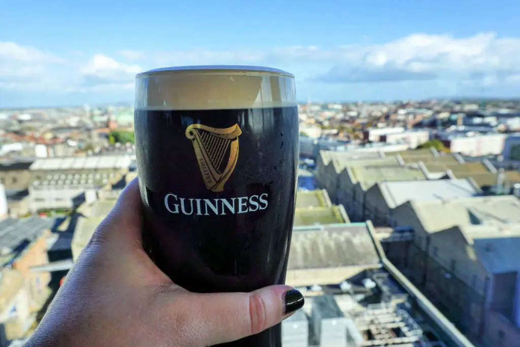 A perfect pint of Guinness at the Guinness Storehouse's panoramic rooftop The Gravity Bar in Dublin, Ireland