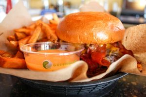 Western burger with fries and mango chutney at Empire Burger in Breckenridge, Colorado, USA