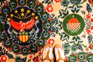 Floral and basketball print on carpeting is one of many design details that celebrate Graduate Bloomington's location in Indiana University college town Bloomington, Indiana.