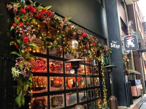 Decorated for the holidays, downtown Detroit bar hosts pop-up Sippin' Santa at The Skip.