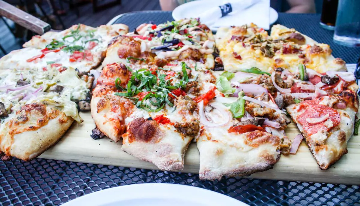 Mitten Brewing, known for its pizza flight, is offering carry out during the COVID-19 closure of Michigan restaurants' dine-in services