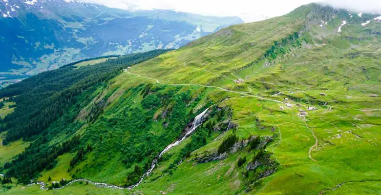 Bachlaeger Waterfall view with Swiss Alps from Grindelwald First