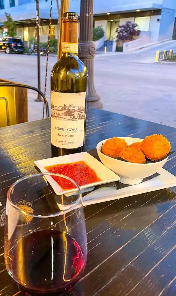 Wine and arancini at Eduardo's Enoteca in Chicago