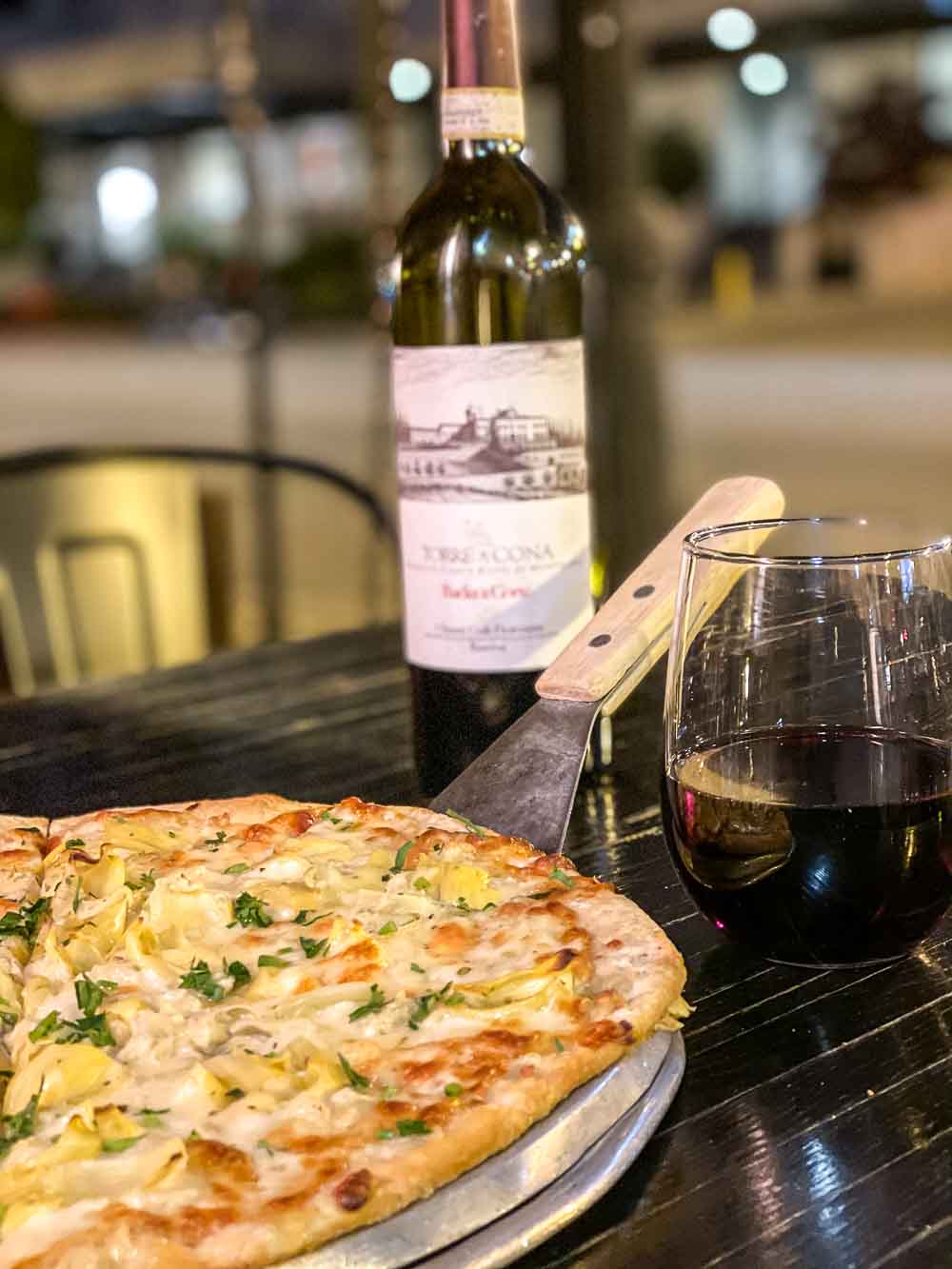Italian red wine and pizza at Eduardo's Enoteca Gold Coast in Chicago