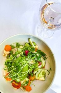 California vegetable salad and rosé wine at LUXBAR in Chicago's Gold Coast neighborhood
