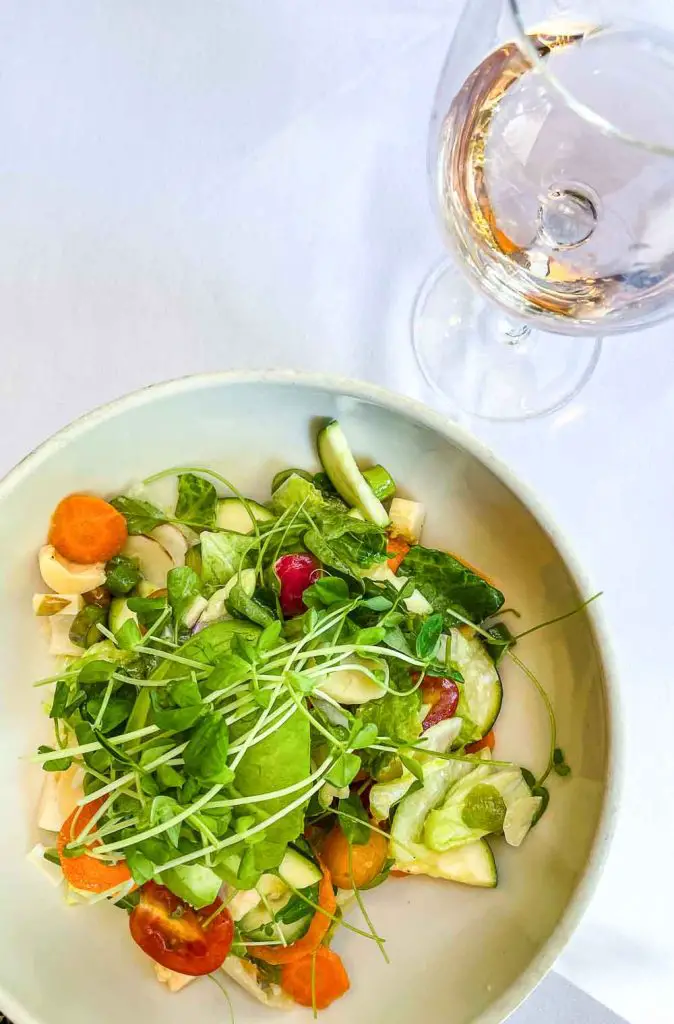 California vegetable salad and rosé wine at LUXBAR in Chicago's Gold Coast neighborhood