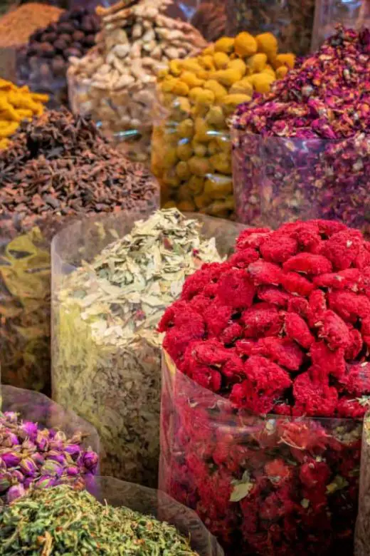 Colorful piles of spices in Dubai souks, United Arab Emirates