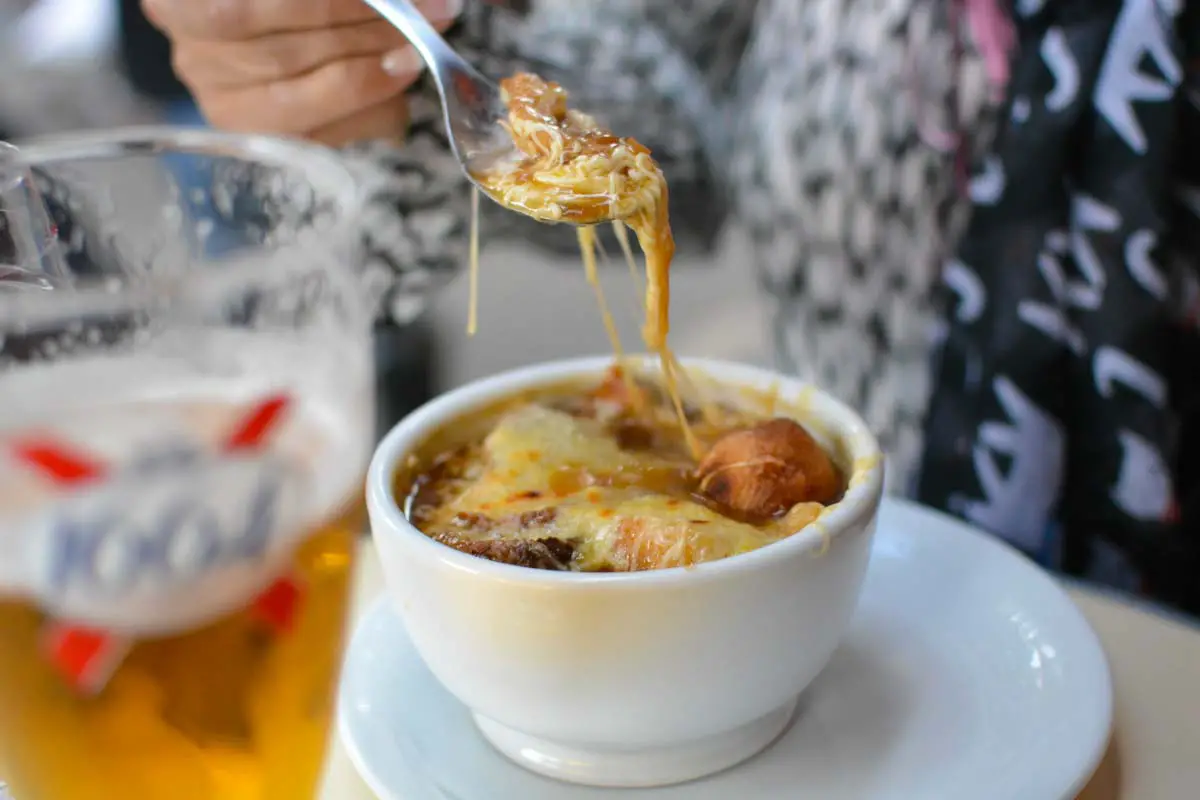 French Onion Soup and beer at Parisian cafe