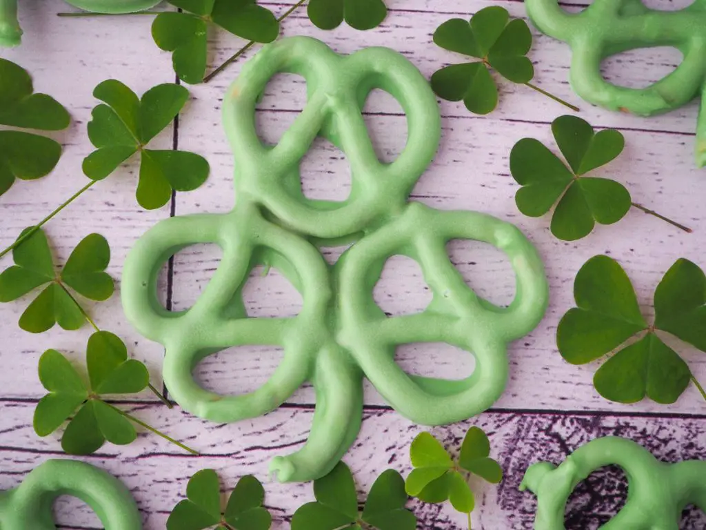 Green shamrock-shaped chocolate-covered pretzel