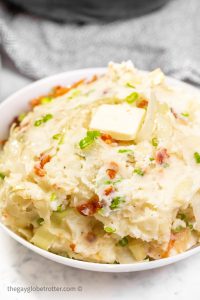 Irish colcannon mashed potato dish with pat of butter melting on top