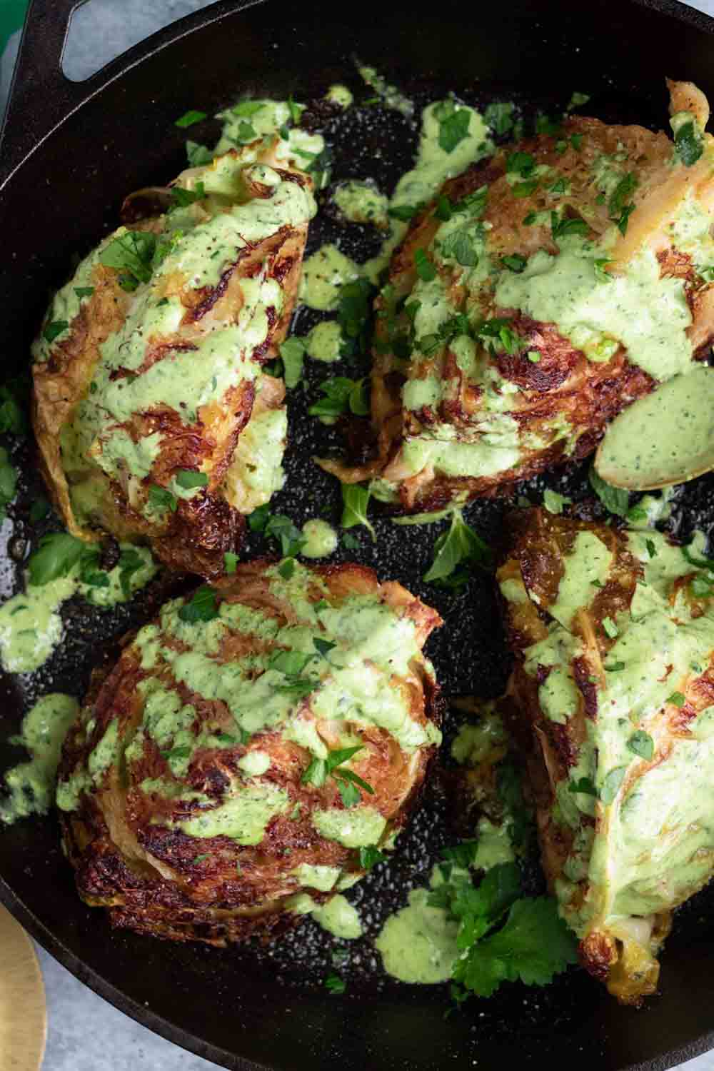 roasted green cabbage with green tahini sauce
