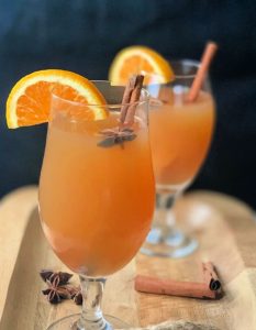 Hot spiked apple cider or mulled cider cocktails