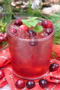 Cranberry Margarita Spritzer in a festive holiday setting
