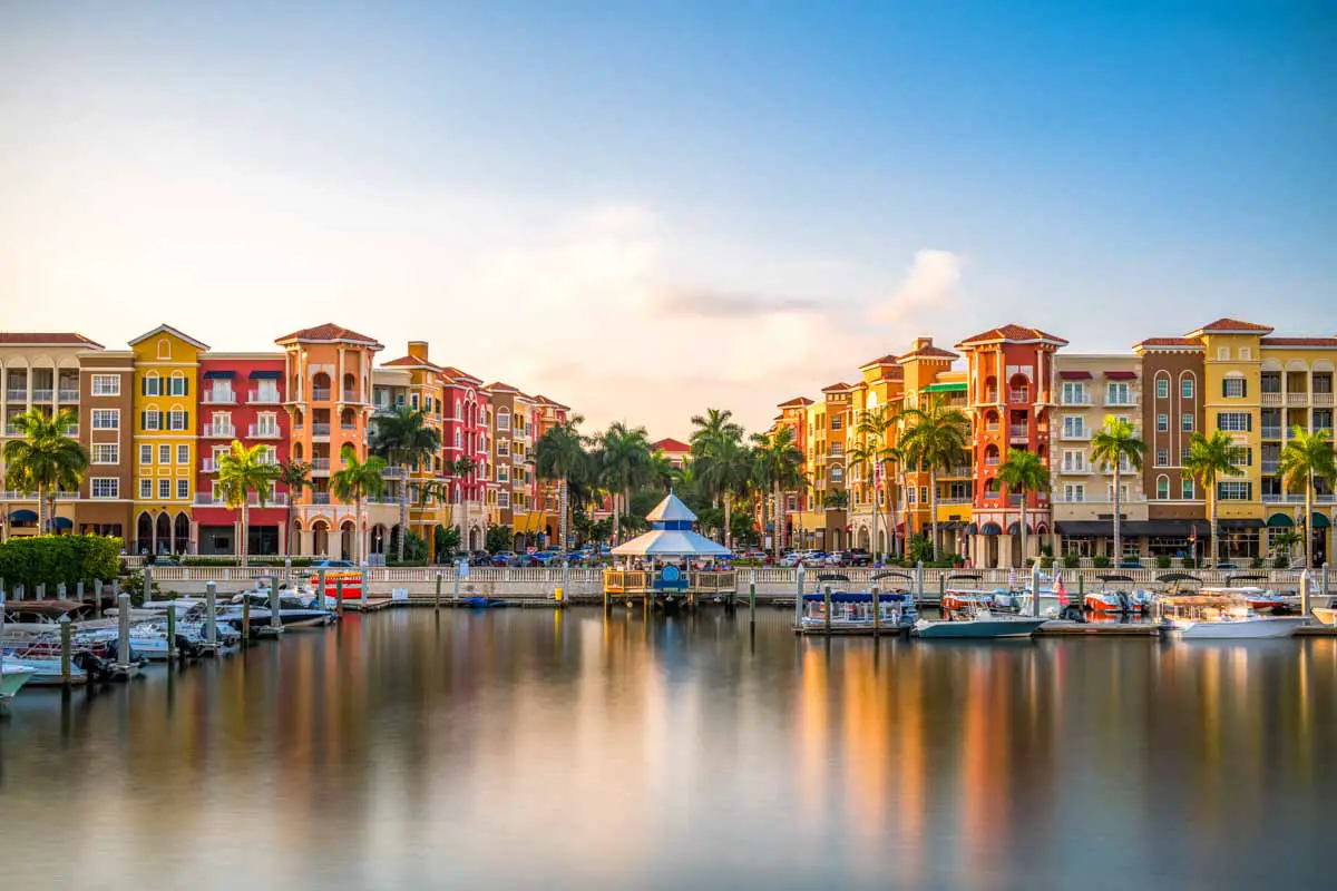 The view of the Naples, Florida, cityscape from the bay at dusk