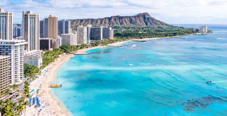 Aerial view of Waikiki Beach iwith Diamond Head in the distance in Honolulu, Hawaii, on the Hawaiian island Oahu