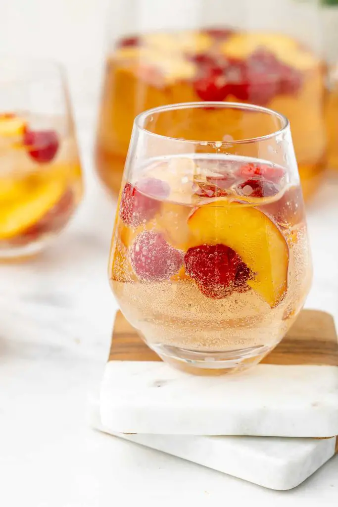 Sparkling rosé peach-raspberry sangria