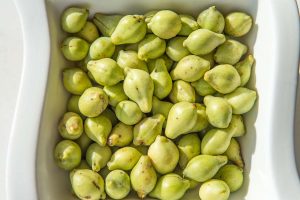 Australian Kakadu plums in a white bowl