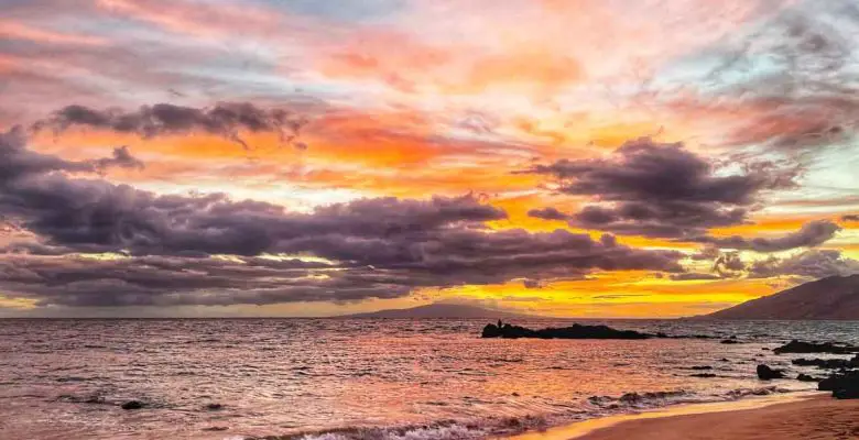 Sunset view from Kamole Beach III in Kihei, Hawaii, on the island of Maui
